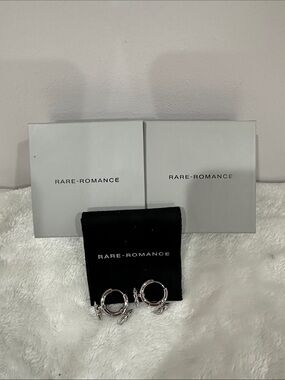 Polished Silver Hoop Earrings with Charm Accents